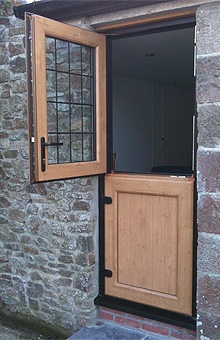 A.D.GLASS supply and install Dark green stable doors in Kingham, Oxfordshire